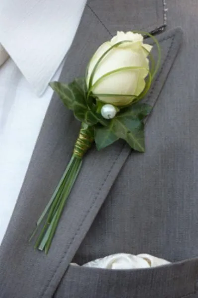 Fotografía de Boutonniere para novio y padrinos